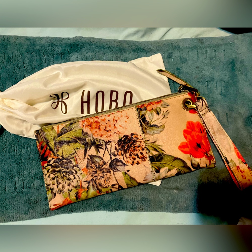 Brand new Hobo clutch/wallet in beautiful, unique botanical print.